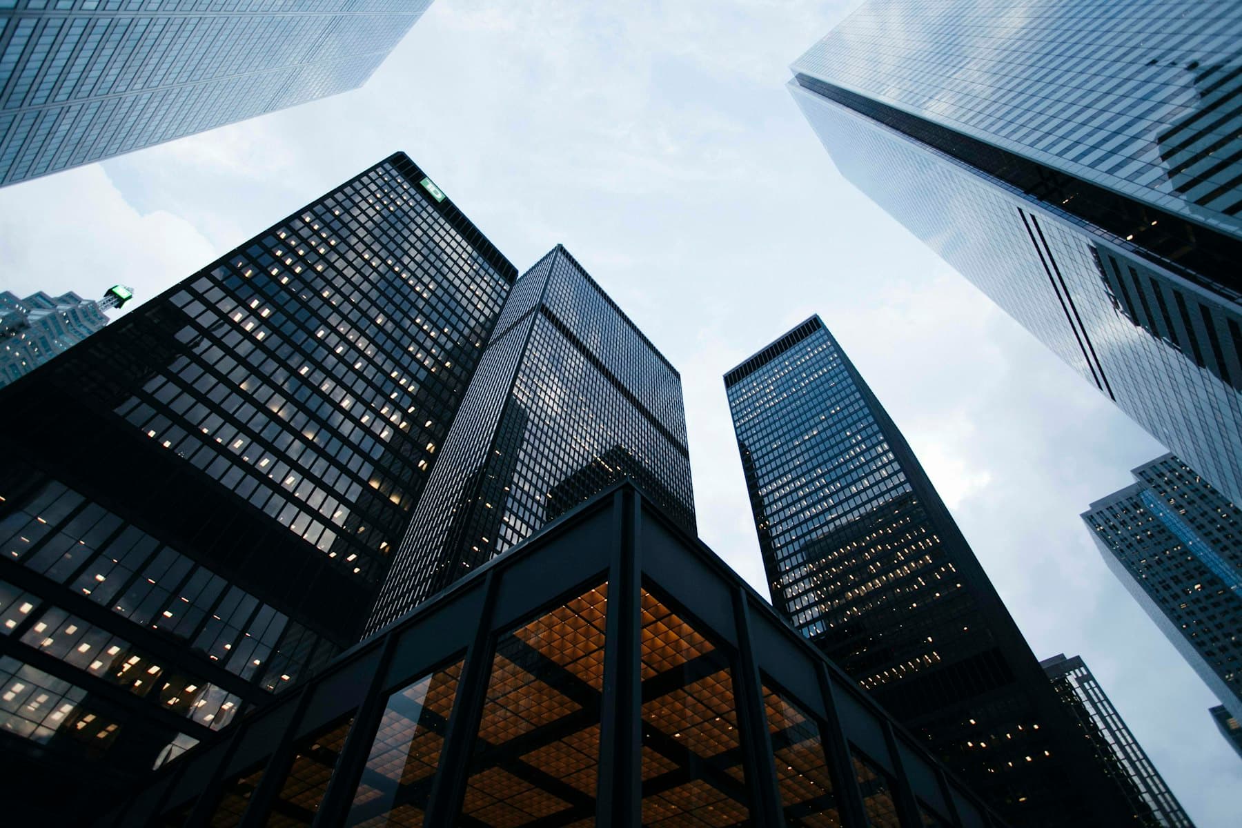 Corporate buildings representing organisations across sectors.