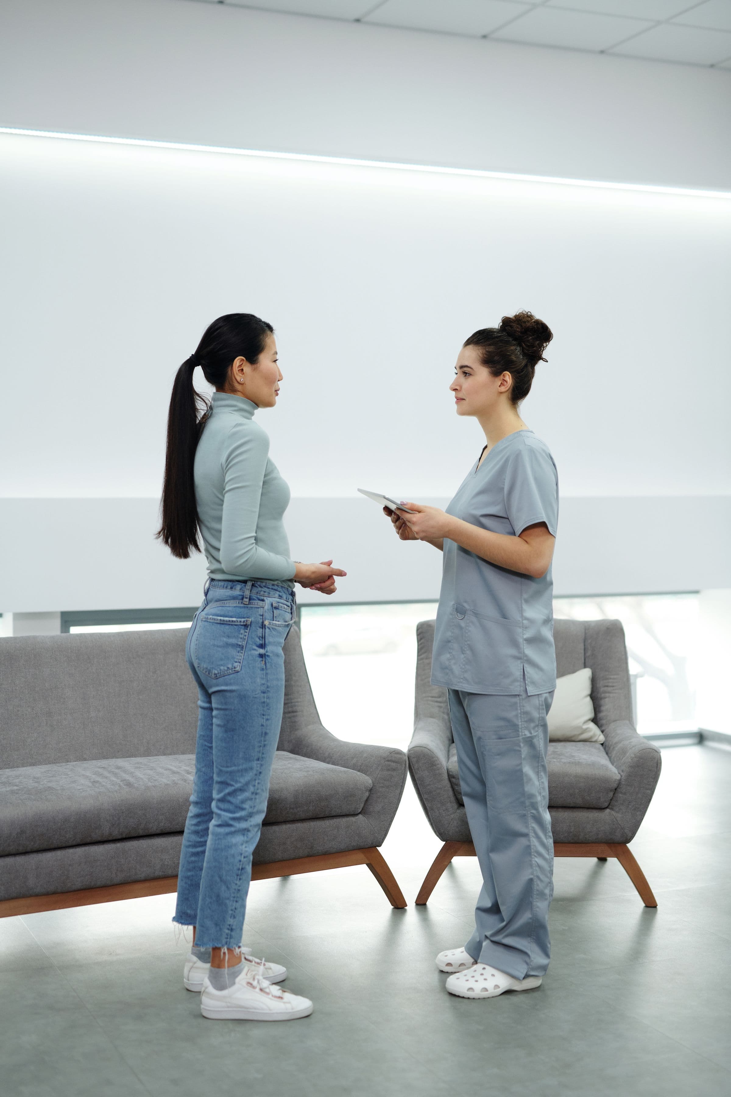 Hospital and clinic front-of-house during a busy visiting hour.