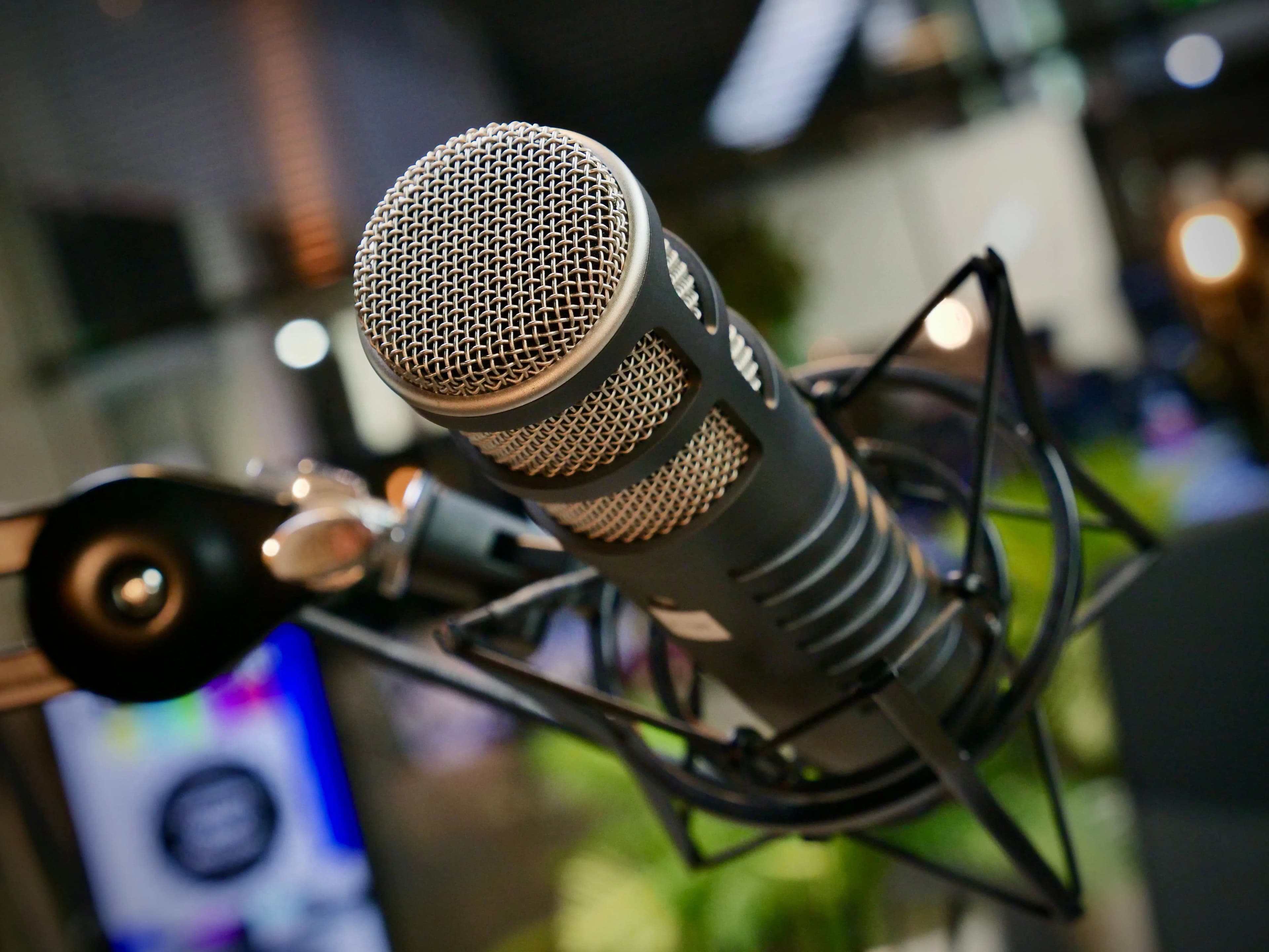 Broadcast microphone in a professional podcast studio.