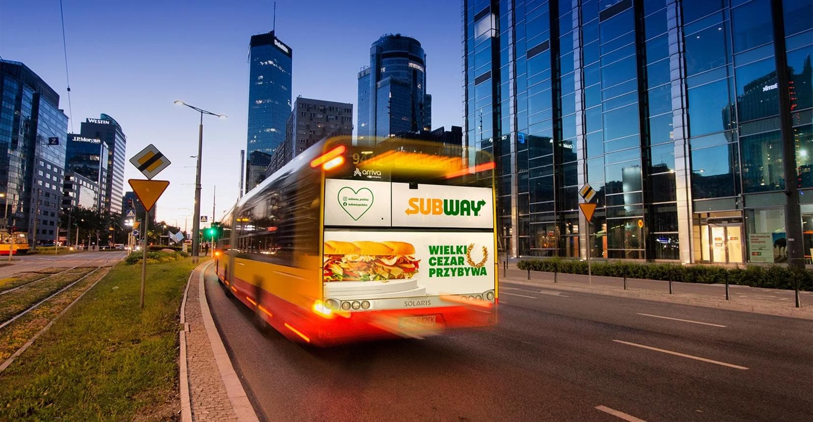 Digital advertising screens in a transit and mobility setting.